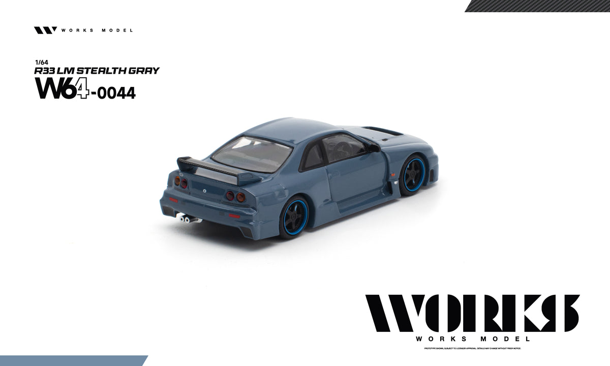 Works 1/64 R33 LM diecast model in Stealth Gray, paper packaging